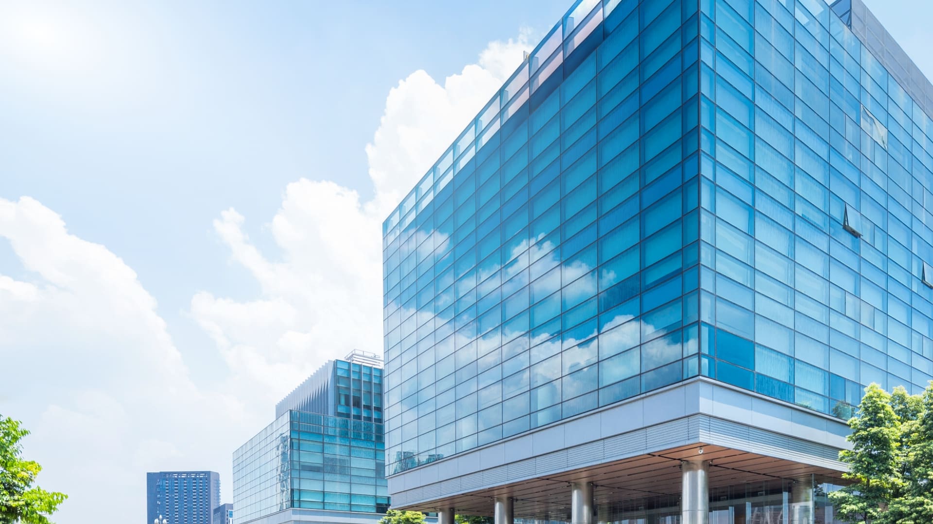 Blue skyline with modern glass building